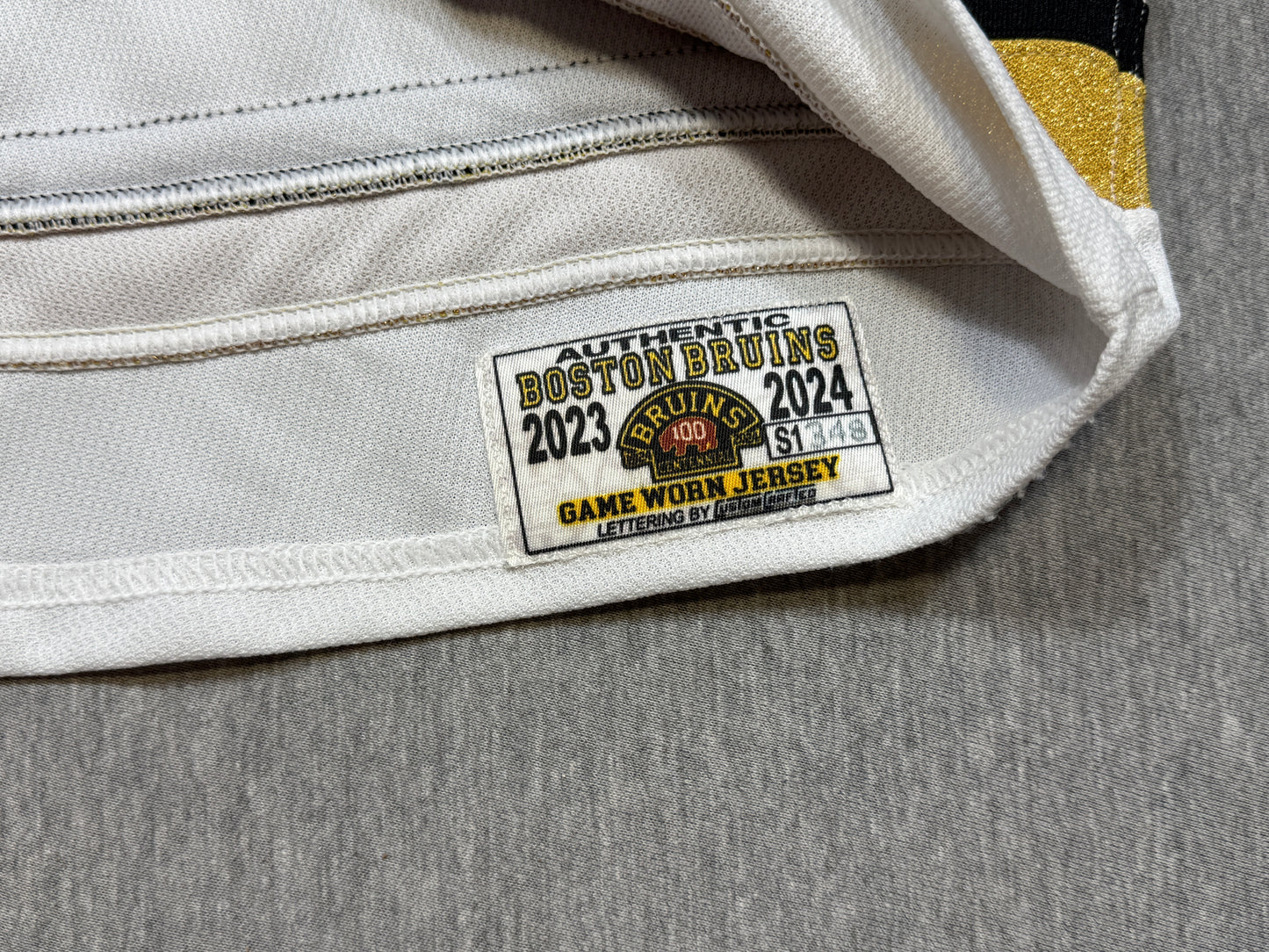 Boston Bruins 100th Season Matt Grzelcyk Game Worn Jersey